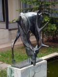 Statue of drinking stag